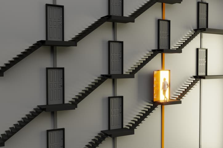 An abstract staircase and gray colored doors, orange colored one is open and a man going in, symbolizing choice concept. ( 3d render )